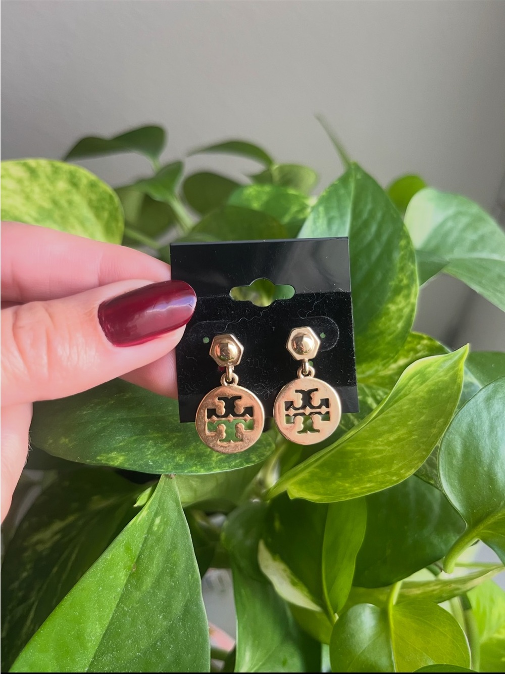Tory Burch logo gold tone earrings